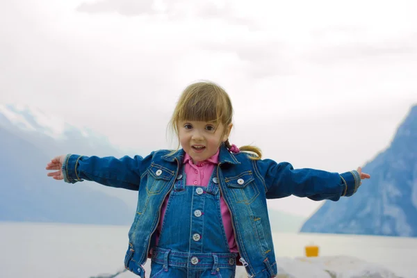 Happy little girl outdoors — Stock Photo, Image