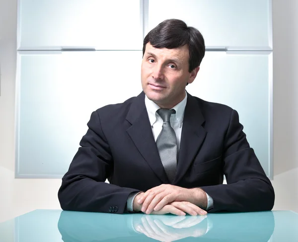 Businessman in his modern office — Stock Photo, Image