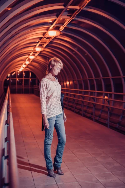 Young female in night city — Stock Photo, Image