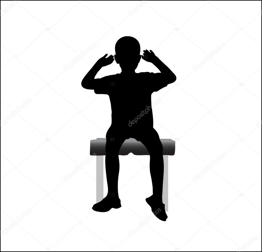 boy sitting on chair with hands up