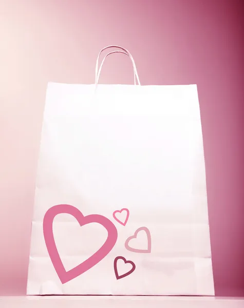 Shopping bag with heart — Stock Photo, Image