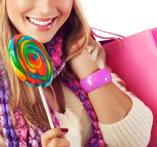 Woman eating sweet candy — Stock Photo, Image