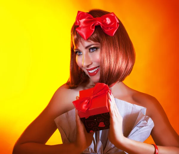 Woman with present — Stock Photo, Image