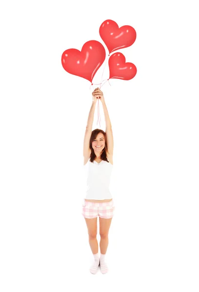 Girl with heart balloons — Stock Photo, Image