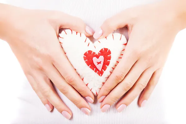 Heart toy in hands — Stock Photo, Image