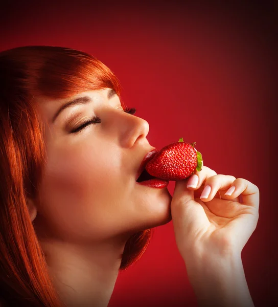 Seductive female with strawberry — Stock Photo, Image