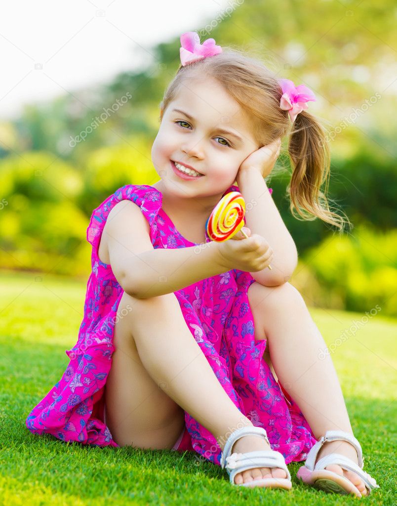 Little girl with lollipop ⬇ Stock Photo, Image by © Anna_Om #20590547