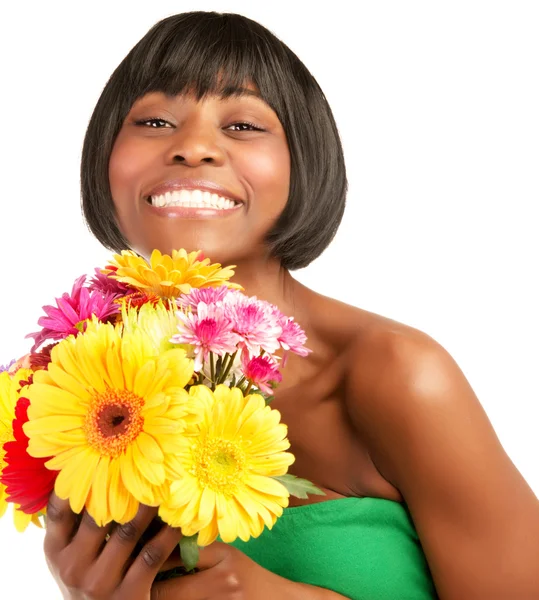 Femme heureuse avec des fleurs — Photo