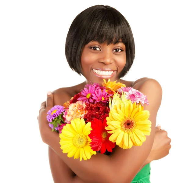 Donna sorridente con fiori freschi — Foto Stock