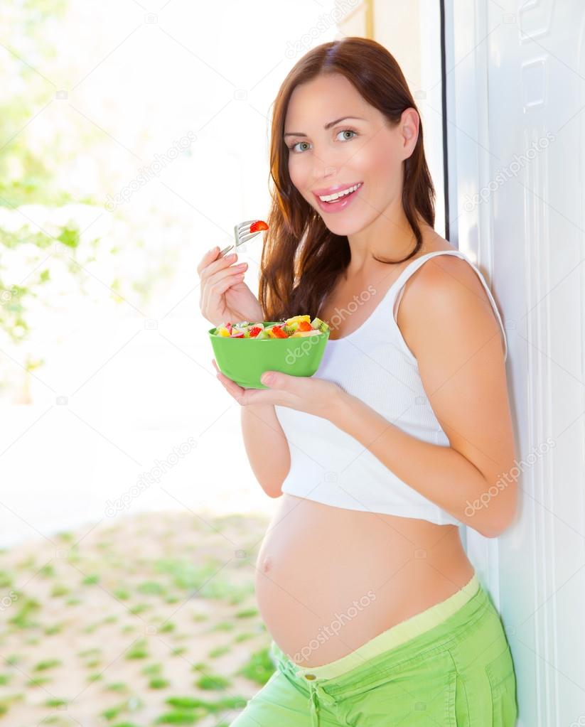 Pregnant female having breakfast