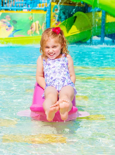 Happy girl on water attractions — Stock Photo, Image