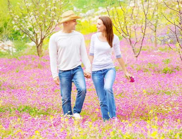 Happy lovers walking outdoors — Stock Photo, Image