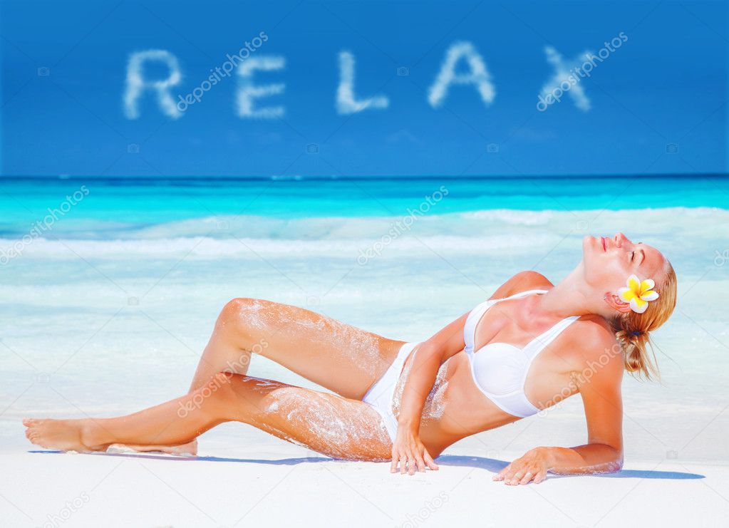 Girl relaxing on the beach