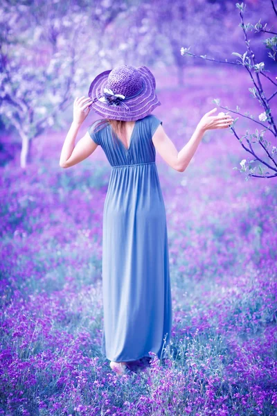 Woman in fantasy garden — Stock Photo, Image