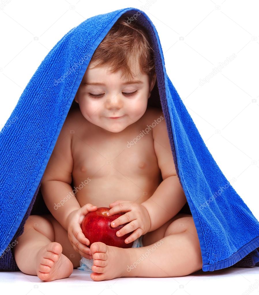 Happy child with fresh fruit