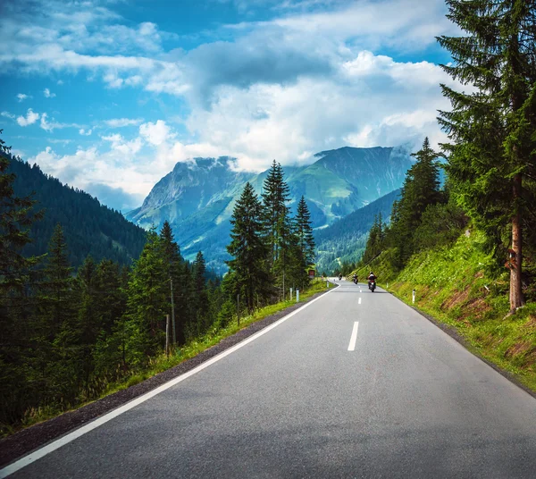 Group of bikers in mountains — Stock Photo, Image