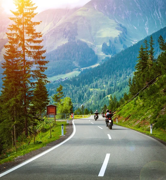 Group of bikers in Alps — Stock Photo, Image