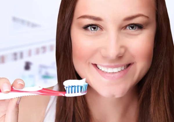 Attractive female clean teeth — Stock Photo, Image