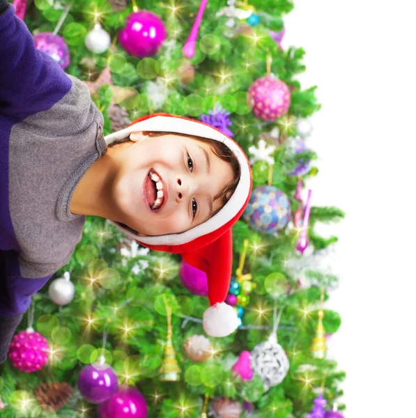 Happy boy wearing Santa hat — Stock Photo, Image