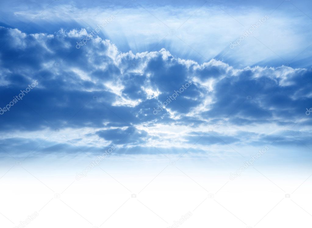 Sunrays through cumulonimbus clouds