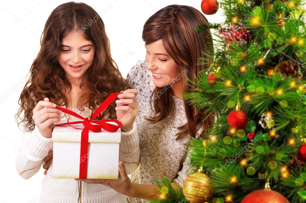 Opening Christmas gift — Stock Photo © Anna_Om #35518179