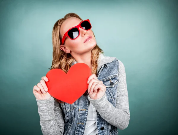 Cute girl with red heart — Stock Photo, Image