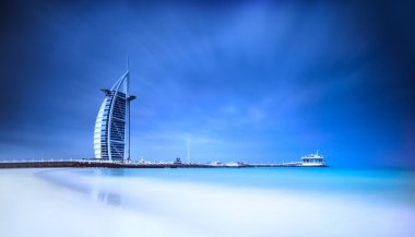 Burj Al Arab hotel on Jumeirah beach in Dubai clipart