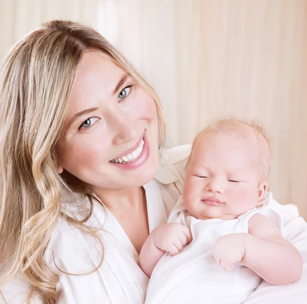 Newborn child sleeping with mom Stock Photo by ©Anna_Om 48277875
