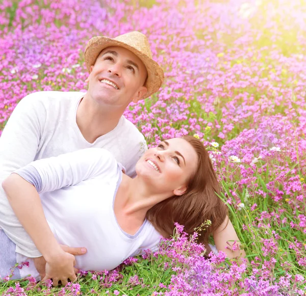 Happy family in spring park — Stock Photo, Image