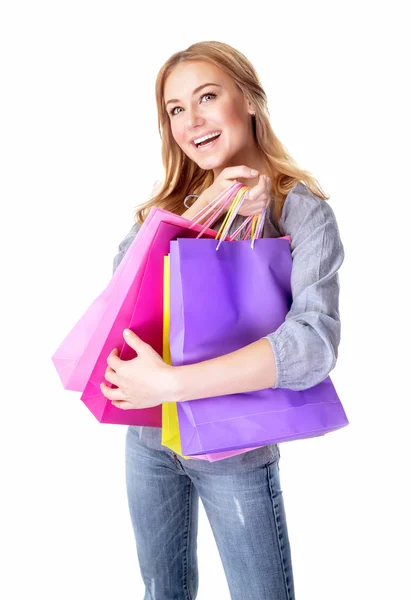 Podekscytowana kobieta z torby na zakupy — Zdjęcie stockowe