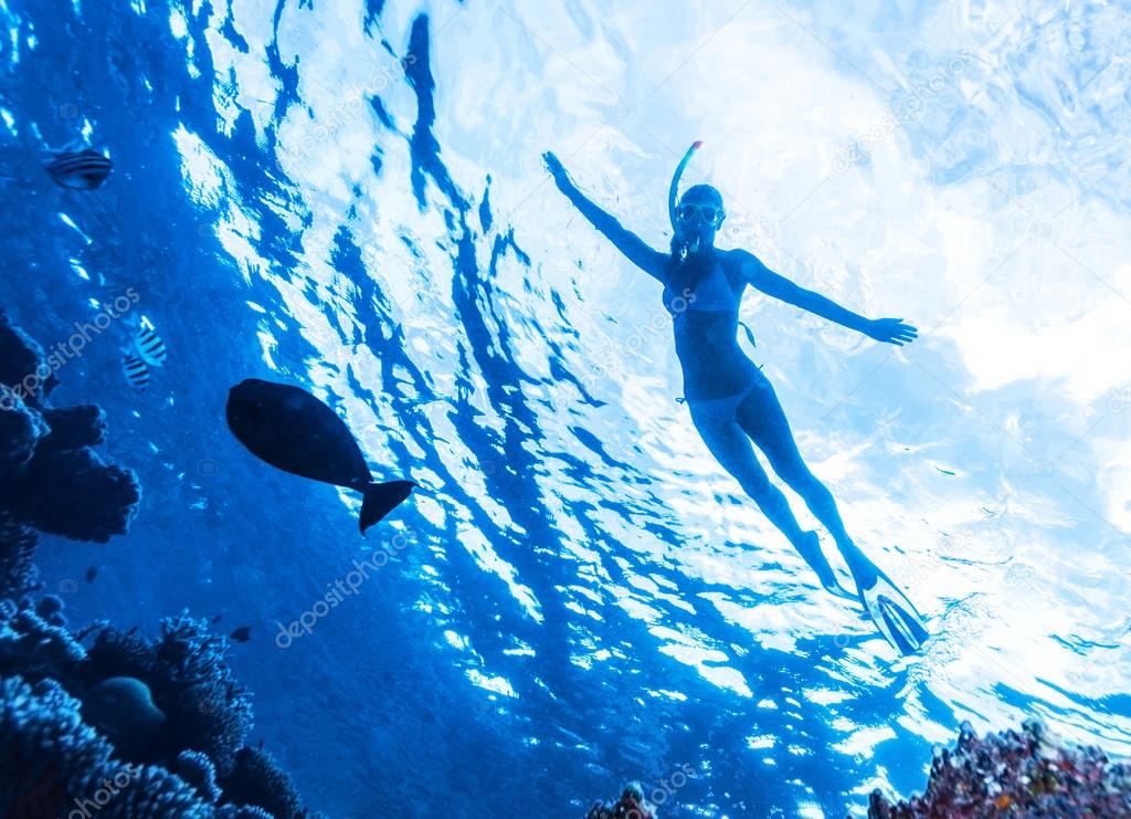 Active woman diving