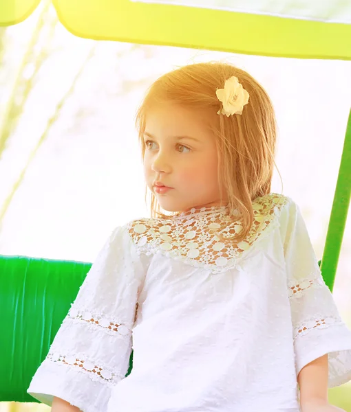 Little girl on the swing — Stock Photo, Image