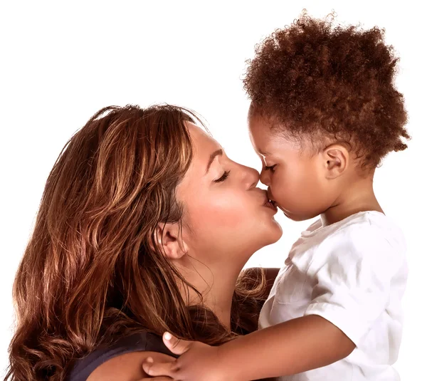 Mãe alegre beijando bebê — Fotografia de Stock