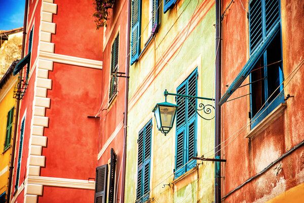 Beautiful colorful facade of Italian house, Portofino, Genoa, small fishing village, traditional European exterior decoration