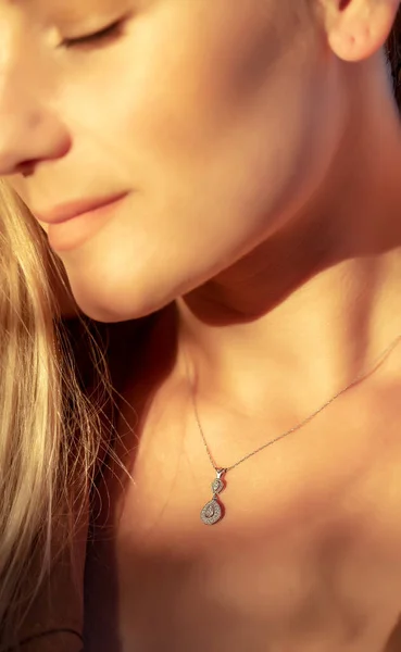 Girl with a Beautiful Pendant on her Neck — Stock Photo, Image