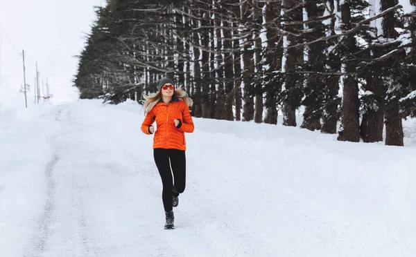 Woman Running in Winter Forest — Stock Photo, Image