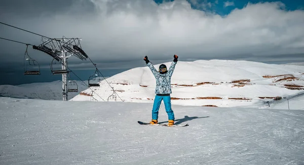 Счастливая сноубордистка — стоковое фото