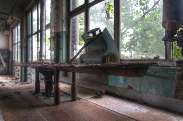 Old iron in abandoned laundry — Stock Photo, Image