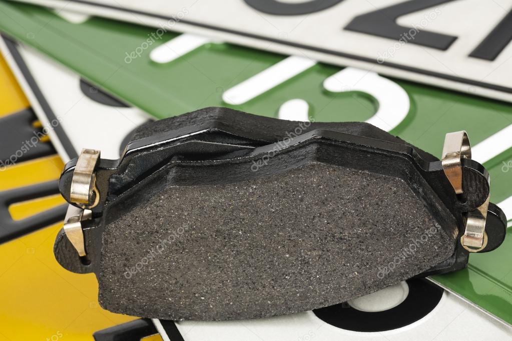 Brake pads and license plates Stock Photo by ©marek_usz 19589073