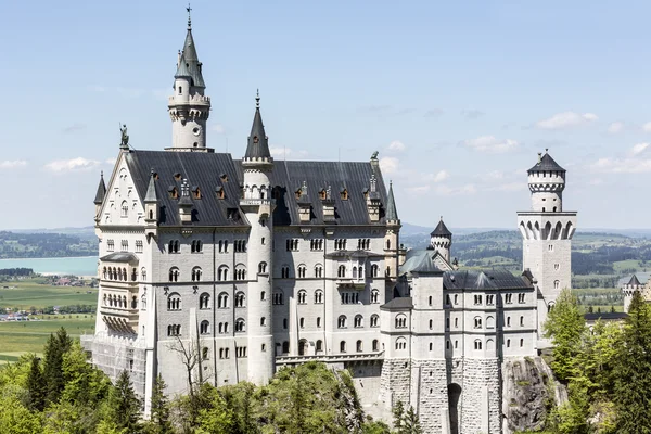 Neuschwanstein above the surrounding country — Stock Photo, Image