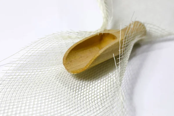 One Small Wooden Scoop Placed Artificial Mesh — Stock Photo, Image
