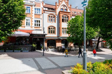 Sopot, Poland - May 31, 2022: A residential building with a restaurant on the ground floor. It is a view of one of the buildings on the city's famous boulevard