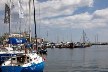 Gdynia, Poland - June 03, 2022: Sailboats moored in the marina located at the southern pier of the port. 