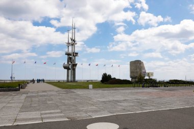 Gdynia, Poland - June 3, 2022: Three masts or sails is a sculpture of Lawrence Samp, which was unveiled in 1980 on the southern pier of the port, i.e. the boulevard leading to the Baltic Sea