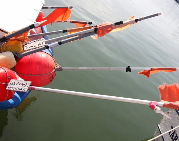 Buoys signaling networks to collect on fishing vessels — Stock Photo, Image