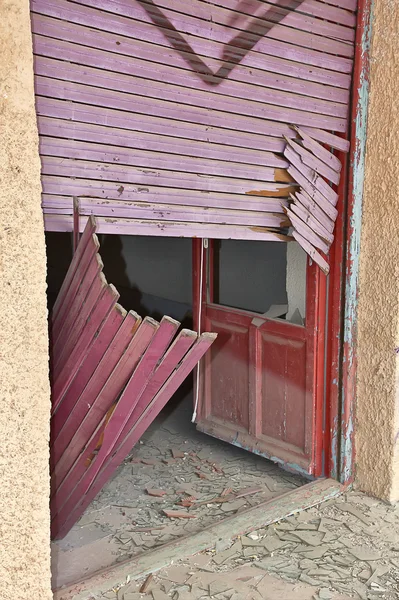 Door shattered by the blast of an explosion — Stock Photo, Image