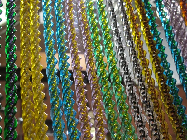 Hastes de cortina enroladas com muitas cores — Fotografia de Stock