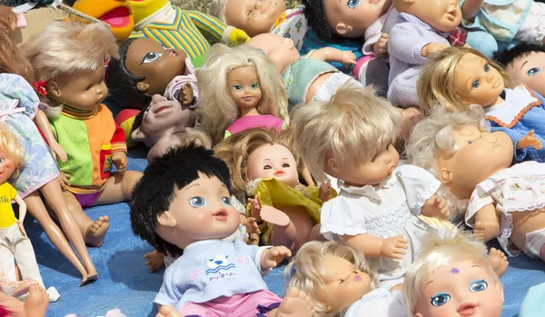 Lot of many dolls of all kinds — Stock Photo, Image