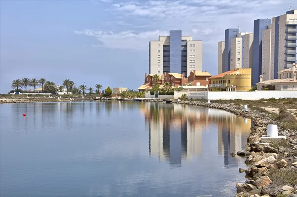 Buildings coast with sea view from a sunny day — Stock Photo, Image