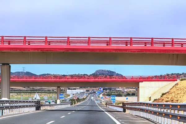 Red Bridge over Highway — Stock Photo, Image